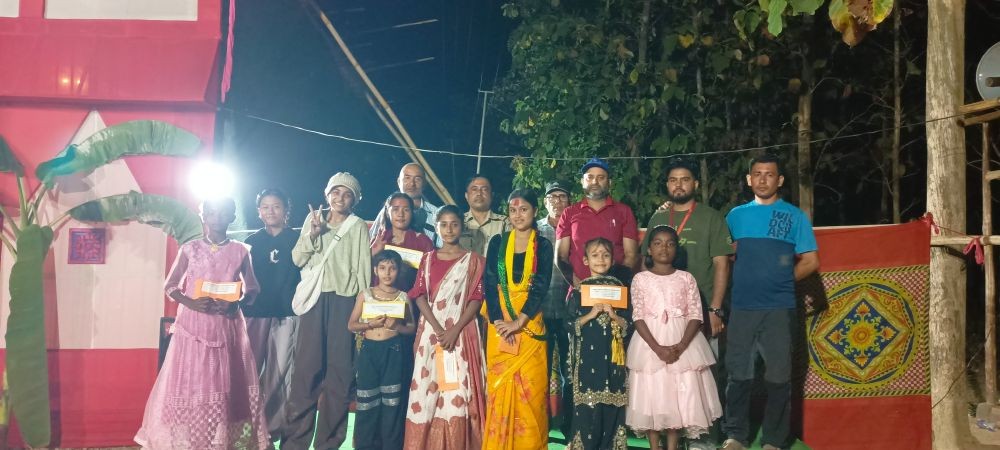 Winners and organizers of the Balijan Open Dance Competition pose for a photo at the Durga Puja pandal in Balijan on October 20.